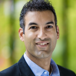 man smiling at the camera